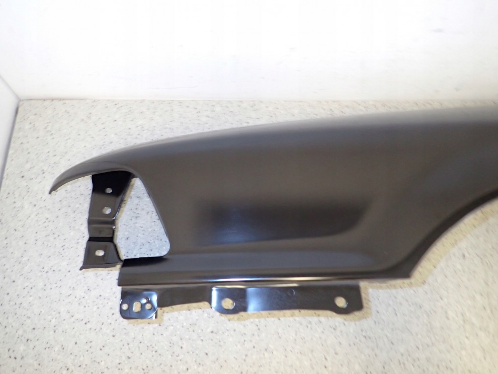 MITSUBISHI GALANT 88-92 BŁOTNIK PRZEDNI LEWY NOWY ORYGINAŁ 4/15