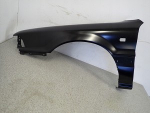 MITSUBISHI GALANT 88-92 BŁOTNIK PRZEDNI LEWY NOWY ORYGINAŁ