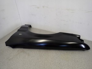 MITSUBISHI GALANT 88-92 BŁOTNIK PRZEDNI LEWY NOWY ORYGINAŁ 6/15 MINIATURA