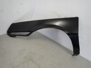 MITSUBISHI COLT LANCER 84-86 BŁOTNIK PRZEDNI LEWY 3/15 MINIATURA