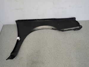 MITSUBISHI COLT LANCER 84-86 BŁOTNIK PRZEDNI LEWY 10/15 MINIATURA