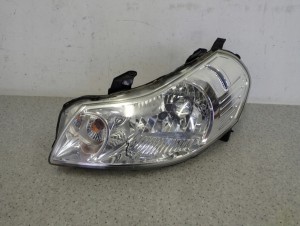 SUZUKI SX4 FIAT SEDICI 06-13 LAMPA PRZEDNIA LEWA REFLEKTOR