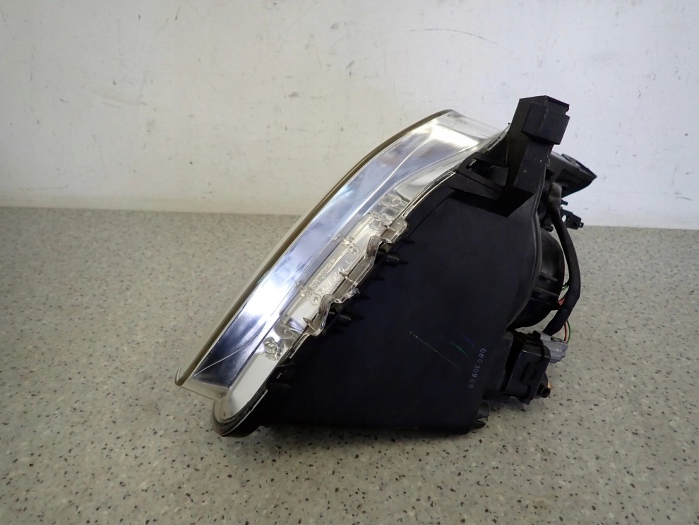 SUZUKI SWIFT 05-09 REFLEKTOR LEWY LAMPA PRZEDNIA LEWA 7/9