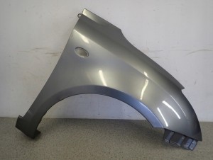 SUZUKI SWIFT MK6 05-09 BŁOTNIK PRZEDNI PRAWY ZCD